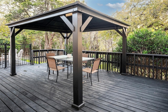 wooden deck featuring a gazebo