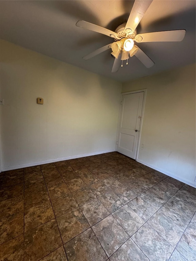 empty room featuring ceiling fan