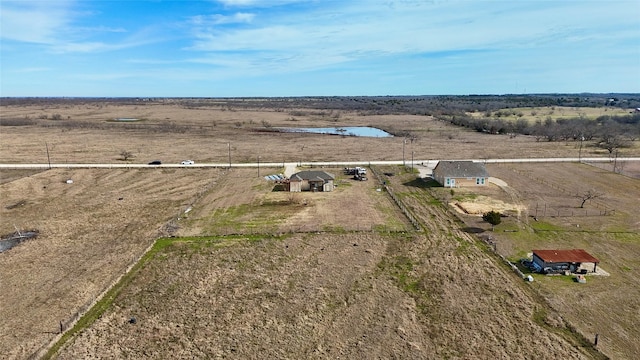 birds eye view of property featuring a rural view