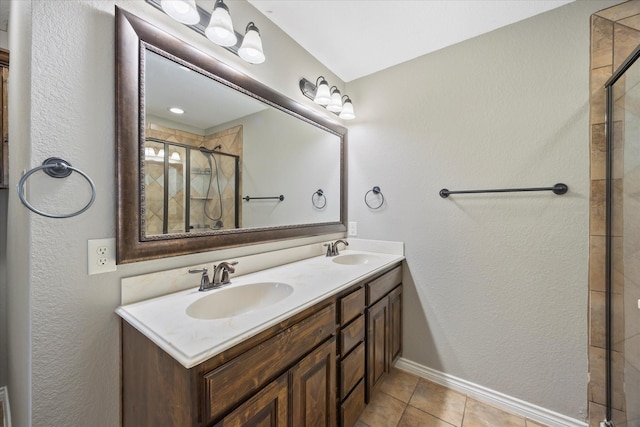 bathroom featuring vanity, tile patterned floors, and an enclosed shower