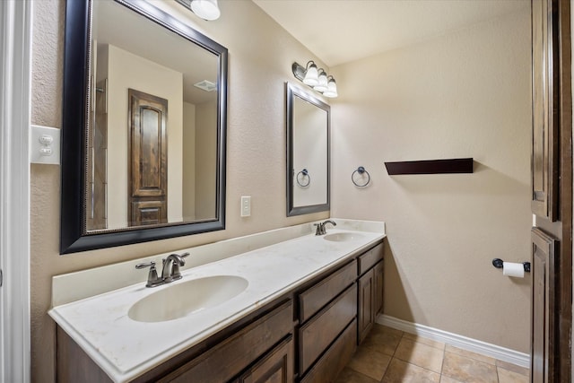 bathroom featuring vanity and tile patterned floors