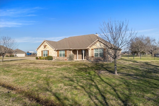 single story home with a front yard