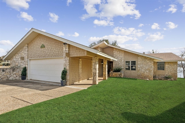 ranch-style house featuring a garage and a front lawn