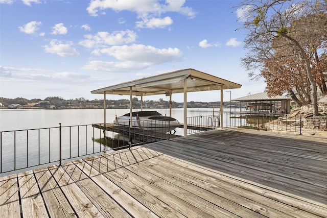 dock area with a water view