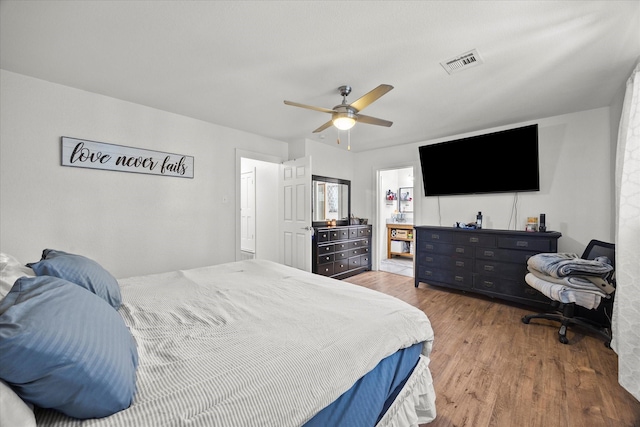 bedroom featuring ceiling fan and hardwood / wood-style flooring