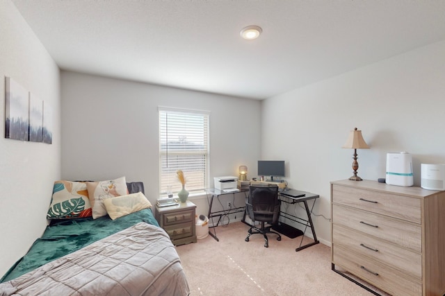 bedroom featuring light carpet