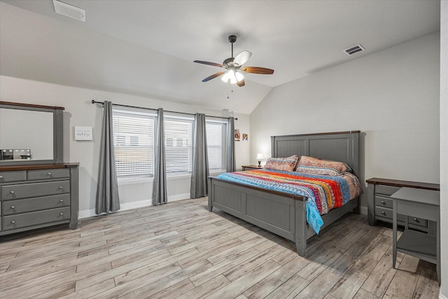 bedroom with ceiling fan and vaulted ceiling