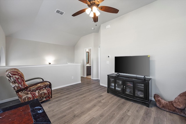 sitting room featuring ceiling fan, lofted ceiling, and hardwood / wood-style flooring