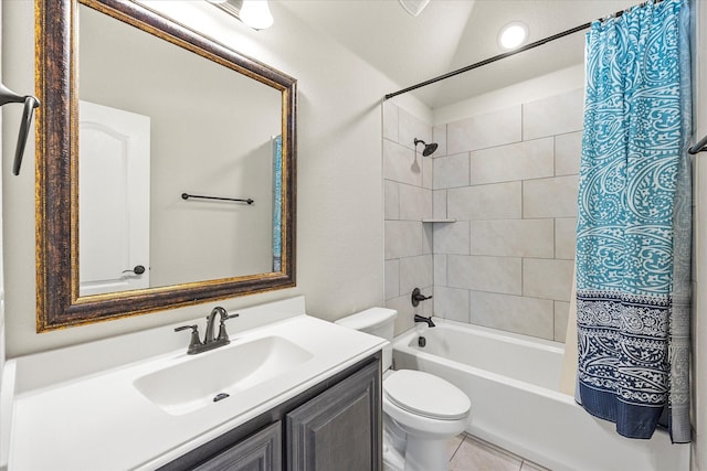 full bathroom featuring toilet, vanity, and shower / tub combo with curtain