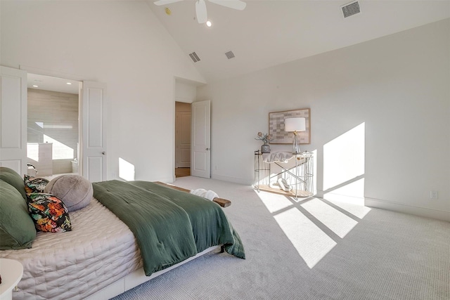 carpeted bedroom with high vaulted ceiling and ceiling fan