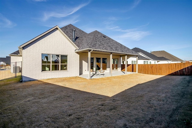 back of house featuring a patio area