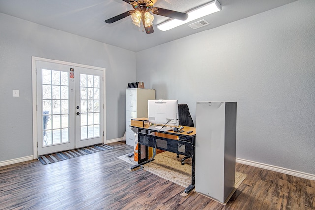 home office featuring ceiling fan, dark hardwood / wood-style flooring, and french doors