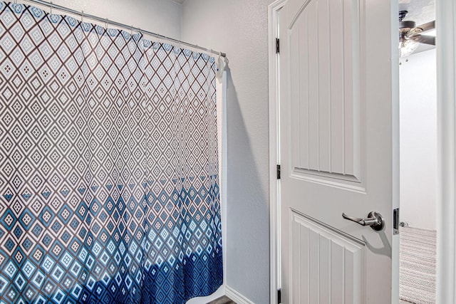 12642 Kollmeyer Way, Fort Worth, TX 76126 - full bathroom featuring a ceiling fan, a shower with shower curtain, and a textured wall