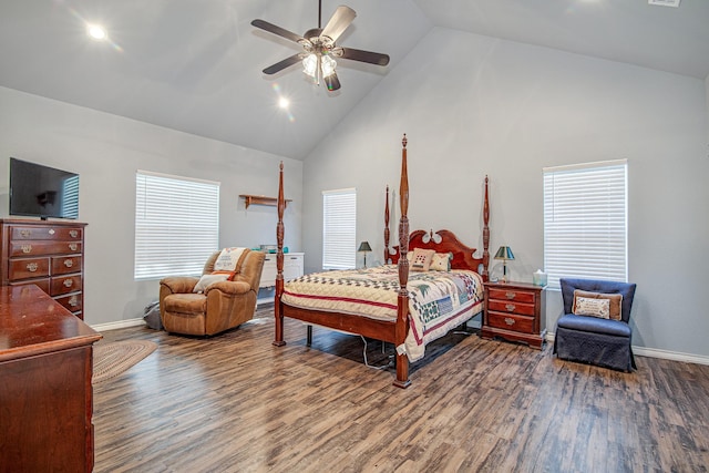 bedroom featuring ceiling fan, dark hardwood / wood-style flooring, and high vaulted ceiling