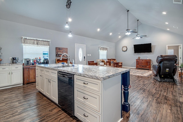 kitchen featuring dishwasher, decorative light fixtures, sink, dark hardwood / wood-style floors, and a center island with sink