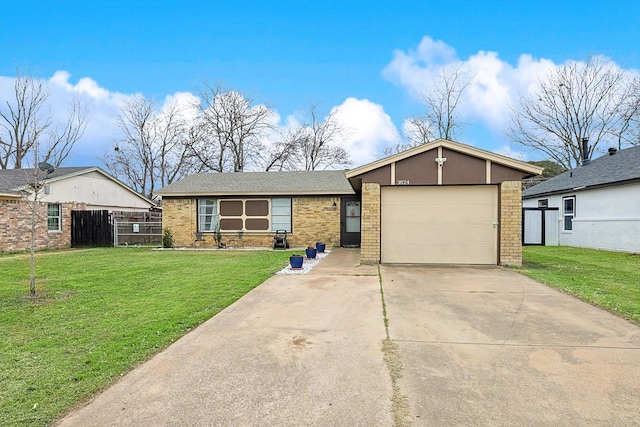 ranch-style home with a garage and a front yard