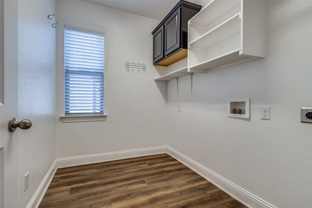 laundry room with a healthy amount of sunlight, washer hookup, dark hardwood / wood-style flooring, and hookup for an electric dryer