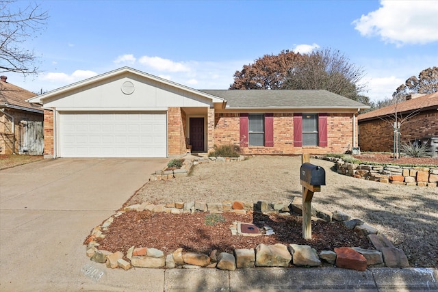 ranch-style house featuring a garage