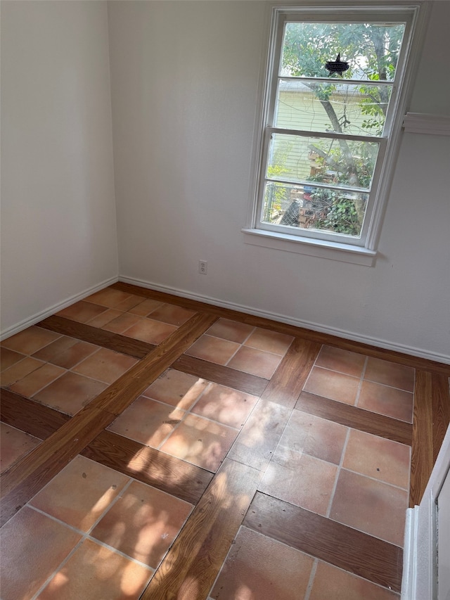 unfurnished room with a wealth of natural light