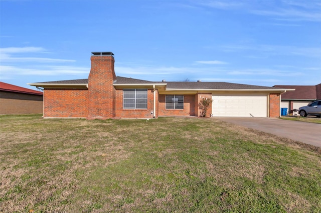 ranch-style home featuring a garage and a front yard