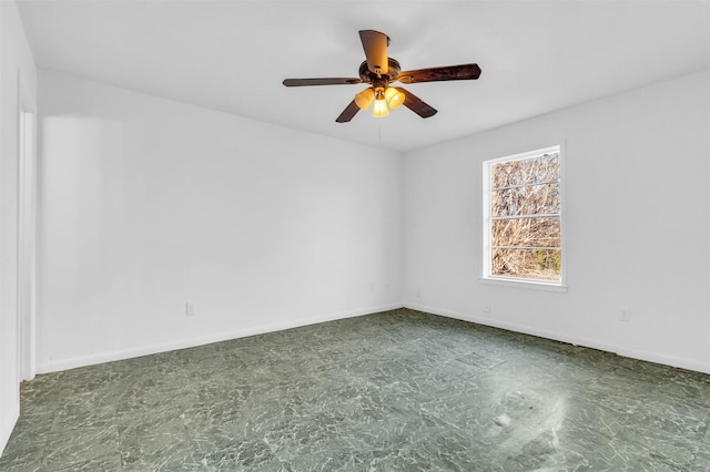 unfurnished room featuring ceiling fan