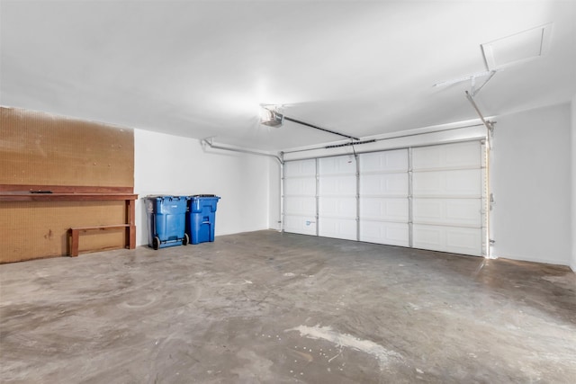 garage featuring a garage door opener