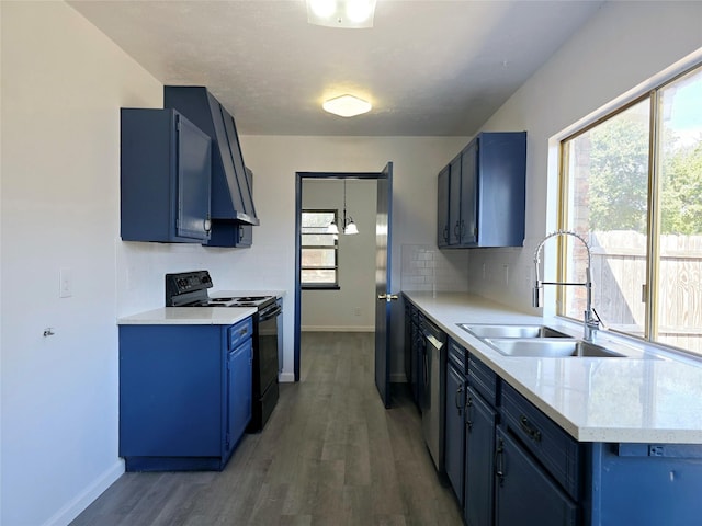 kitchen with dark hardwood / wood-style floors, black appliances, sink, ventilation hood, and blue cabinets