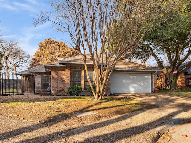 single story home featuring a garage