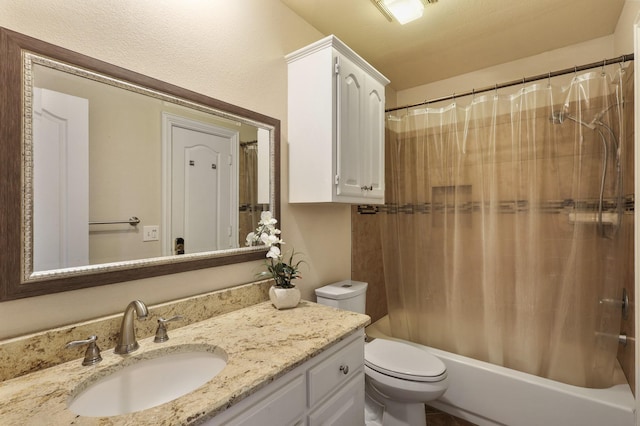 full bathroom featuring toilet, shower / tub combo, and vanity