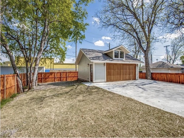 garage with a yard