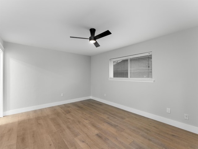 unfurnished room with ceiling fan and light hardwood / wood-style flooring