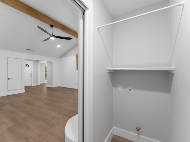 laundry room with ceiling fan, hardwood / wood-style floors, gas dryer hookup, and electric dryer hookup