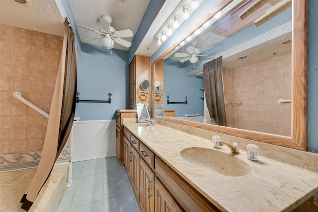 226 Meadowlark Ln, Duncanville, TX 75137 - bathroom featuring a ceiling fan, a wainscoted wall, a sink, and toilet