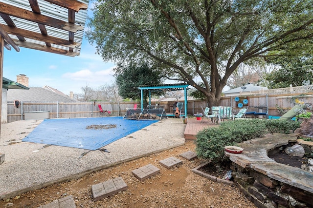 view of swimming pool with a wooden deck