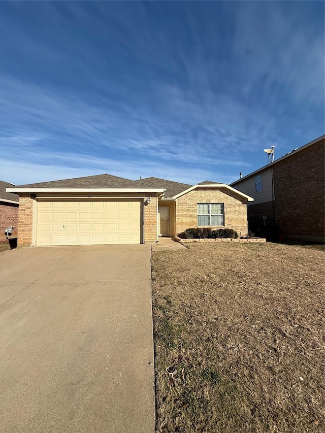 ranch-style house featuring a garage