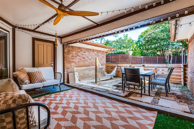 view of patio / terrace featuring ceiling fan