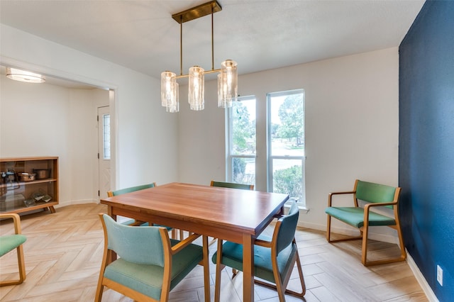 dining room featuring light parquet flooring