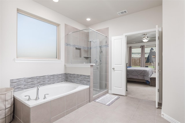 bathroom with ceiling fan, tile patterned floors, and separate shower and tub