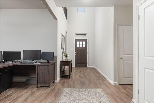 home office featuring light hardwood / wood-style flooring