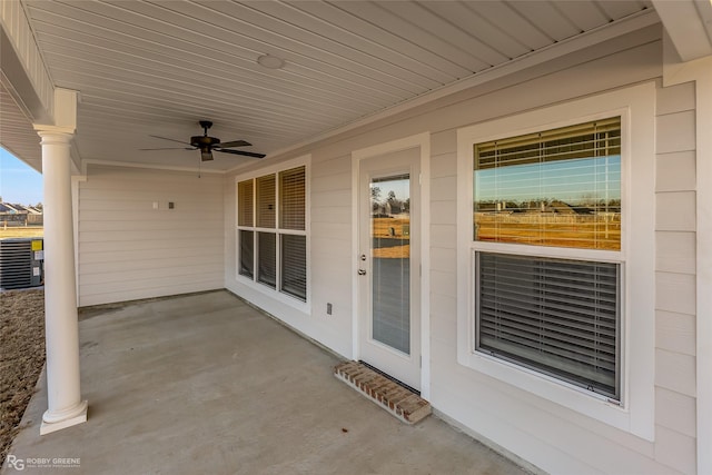 view of patio featuring ceiling fan and central AC