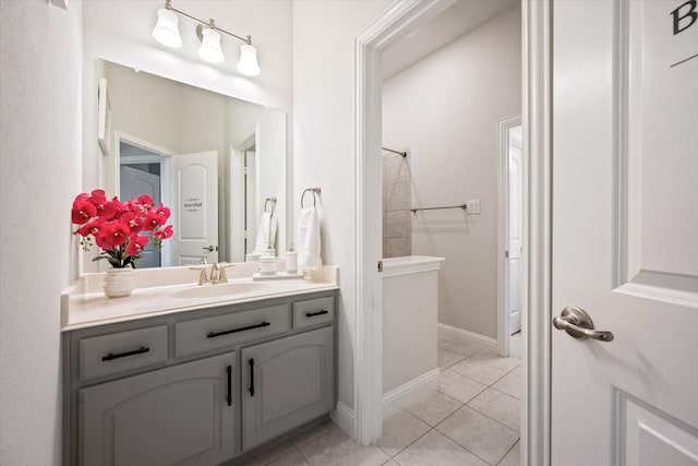 bathroom featuring tile patterned floors and vanity