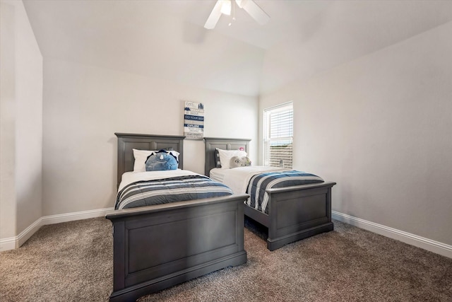 carpeted bedroom with ceiling fan and lofted ceiling