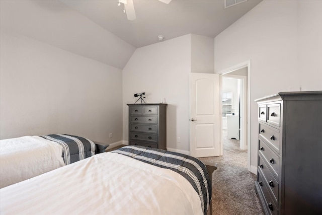 carpeted bedroom featuring ceiling fan and vaulted ceiling