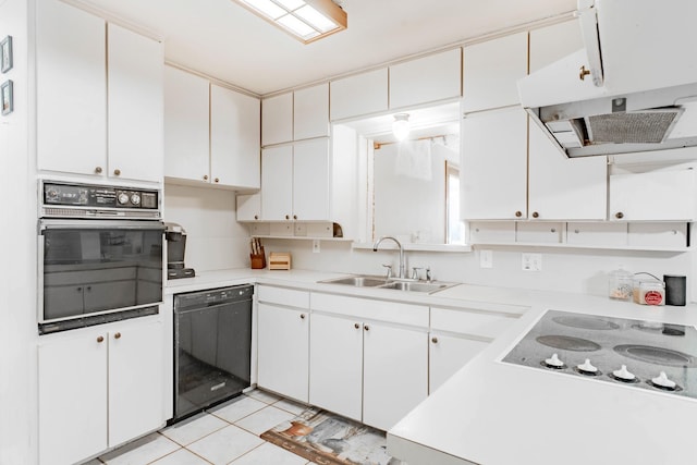 kitchen with sink, white cabinets, and black appliances