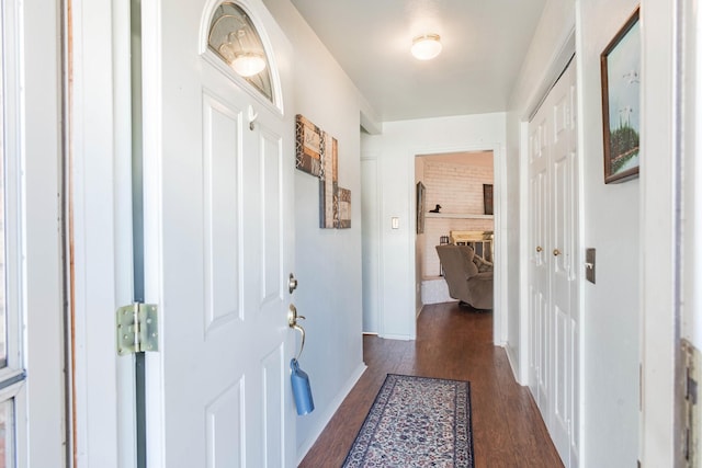 hallway featuring dark hardwood / wood-style floors