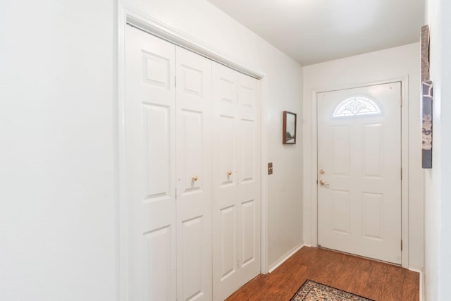 doorway to outside featuring dark hardwood / wood-style floors