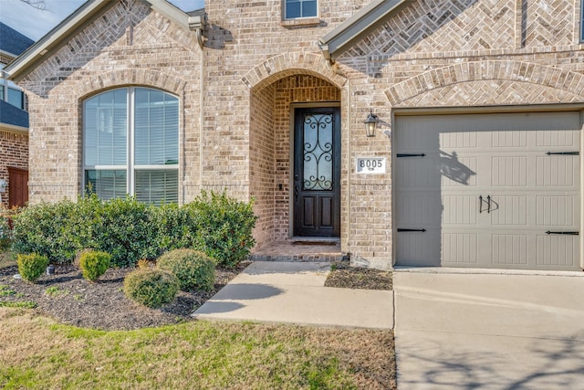 entrance to property with a garage