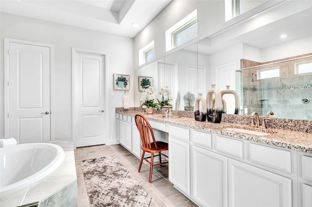 bathroom featuring a shower stall, a bath, vanity, tile patterned flooring, and a high ceiling