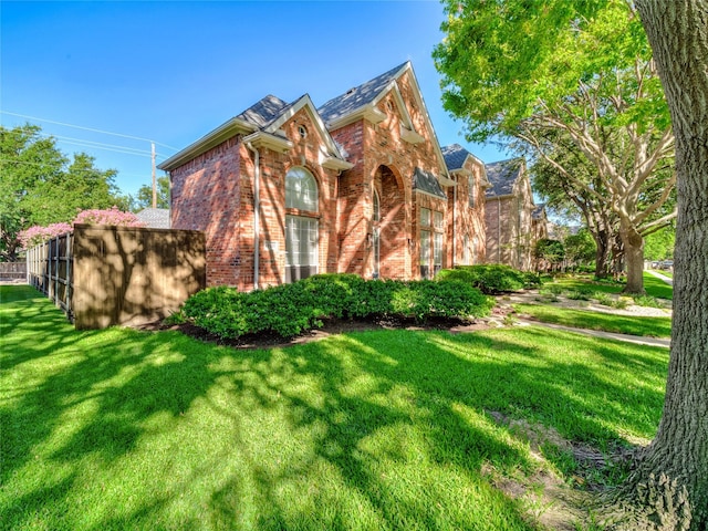 view of front of home with a front lawn