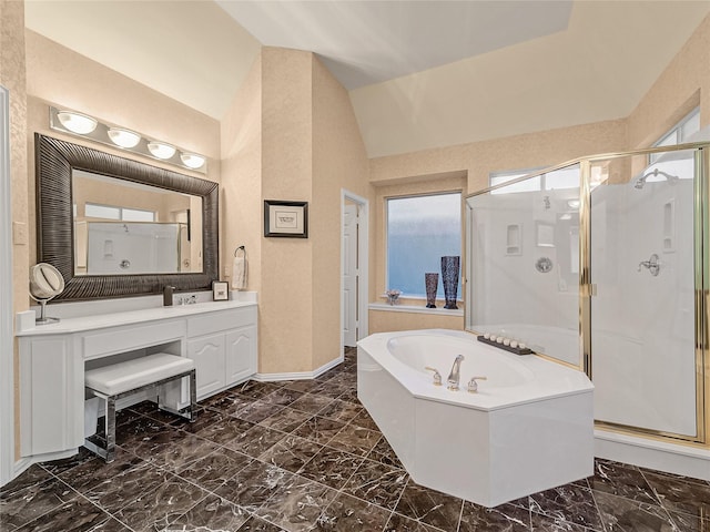 bathroom featuring vanity, lofted ceiling, and shower with separate bathtub